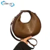 sg-11134201-7rd5x-lwpkxx8uf10zdb.webp Women PU Leather Woven Sling Bag